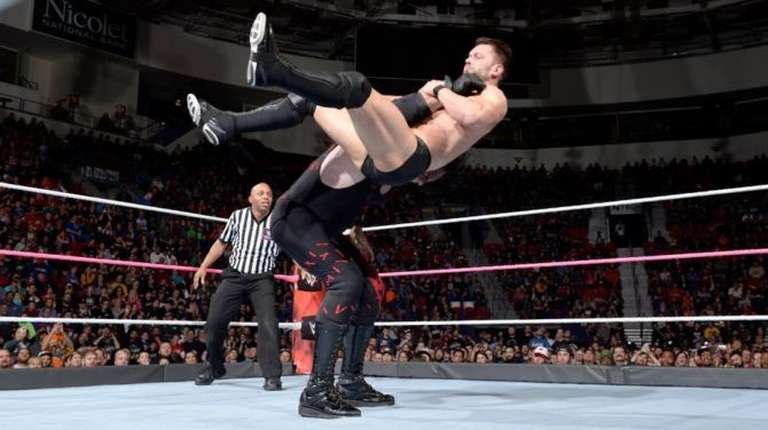 Kane Beating Finn Balor on Raw 